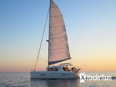 Caldera Catamaran Gold Sunset Cruise with Meal and Drinks